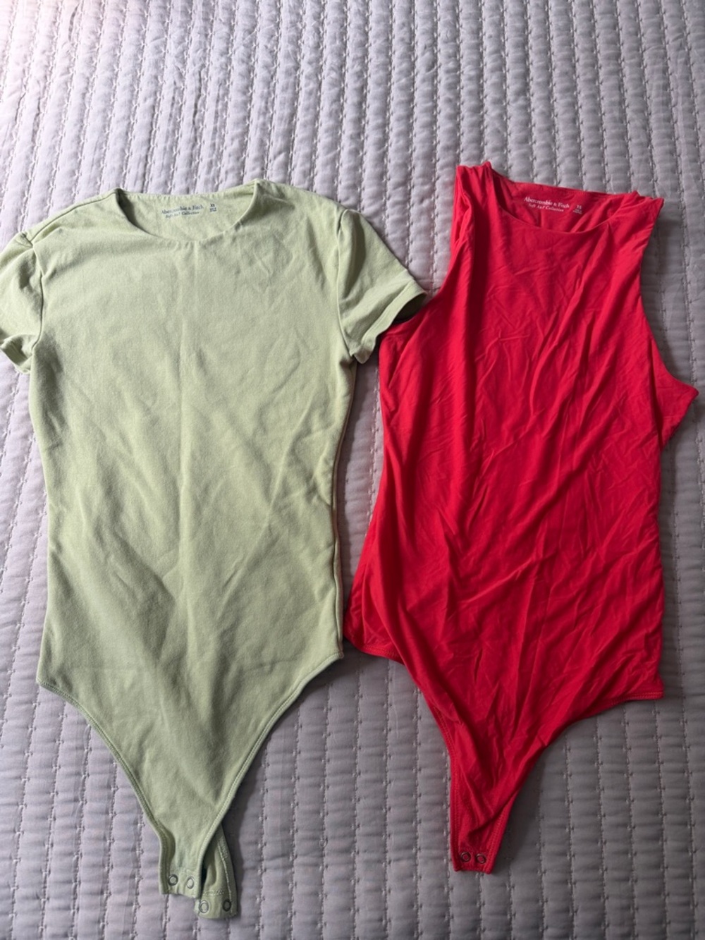 Two-Pack: Pale Green Short Sleeve Bodysuit & Bright Pink Tank Bodysuit